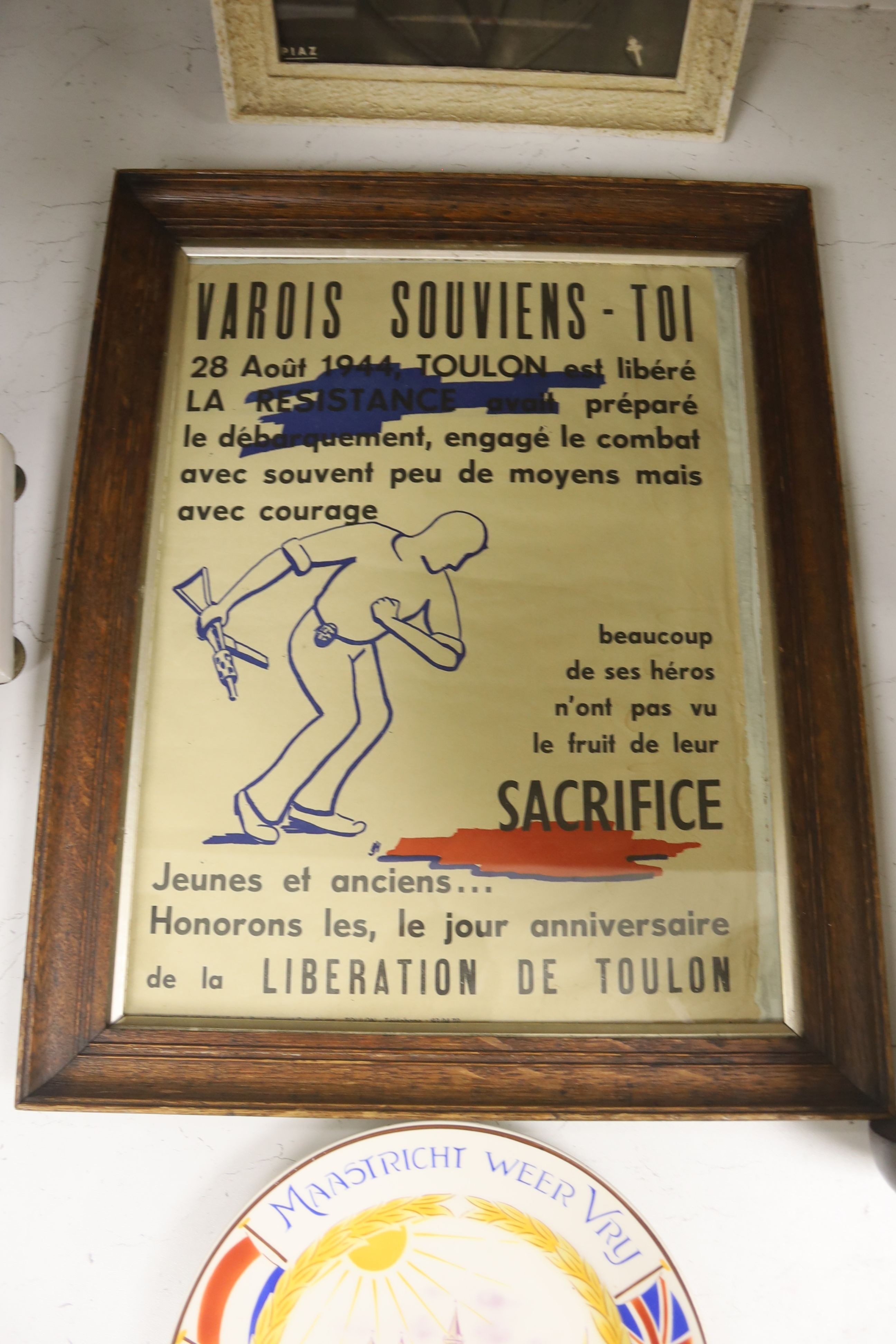 Monochrome photograph bearing signature Gen. De Gaul, dated 1949, together with a Liberation poster, Toulon 1944, a Liberation of Maastricht plate, 1944, and a rare Swiss Red Cross Prisoner's Parcels box